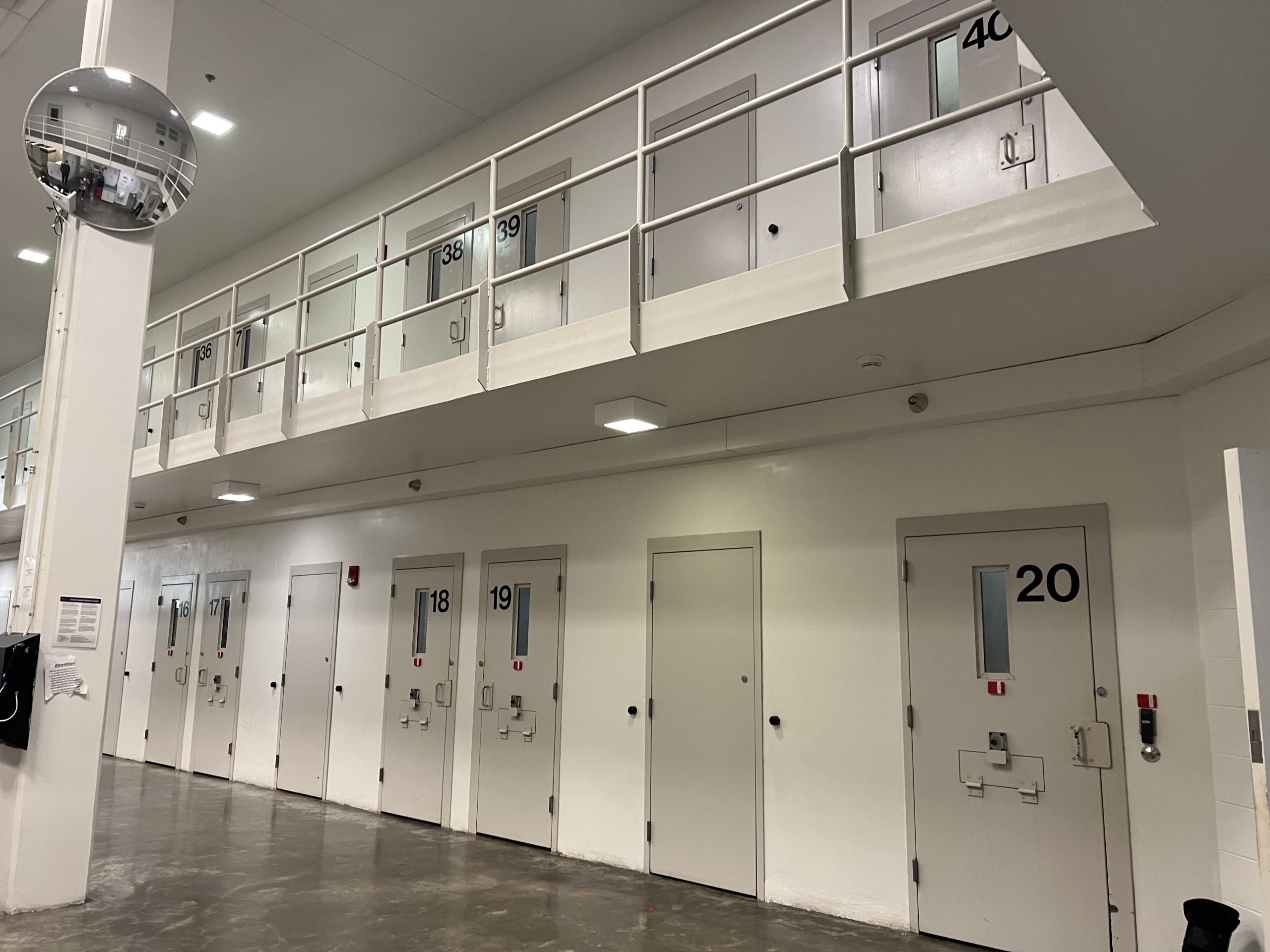 A series of cell doors in a jail