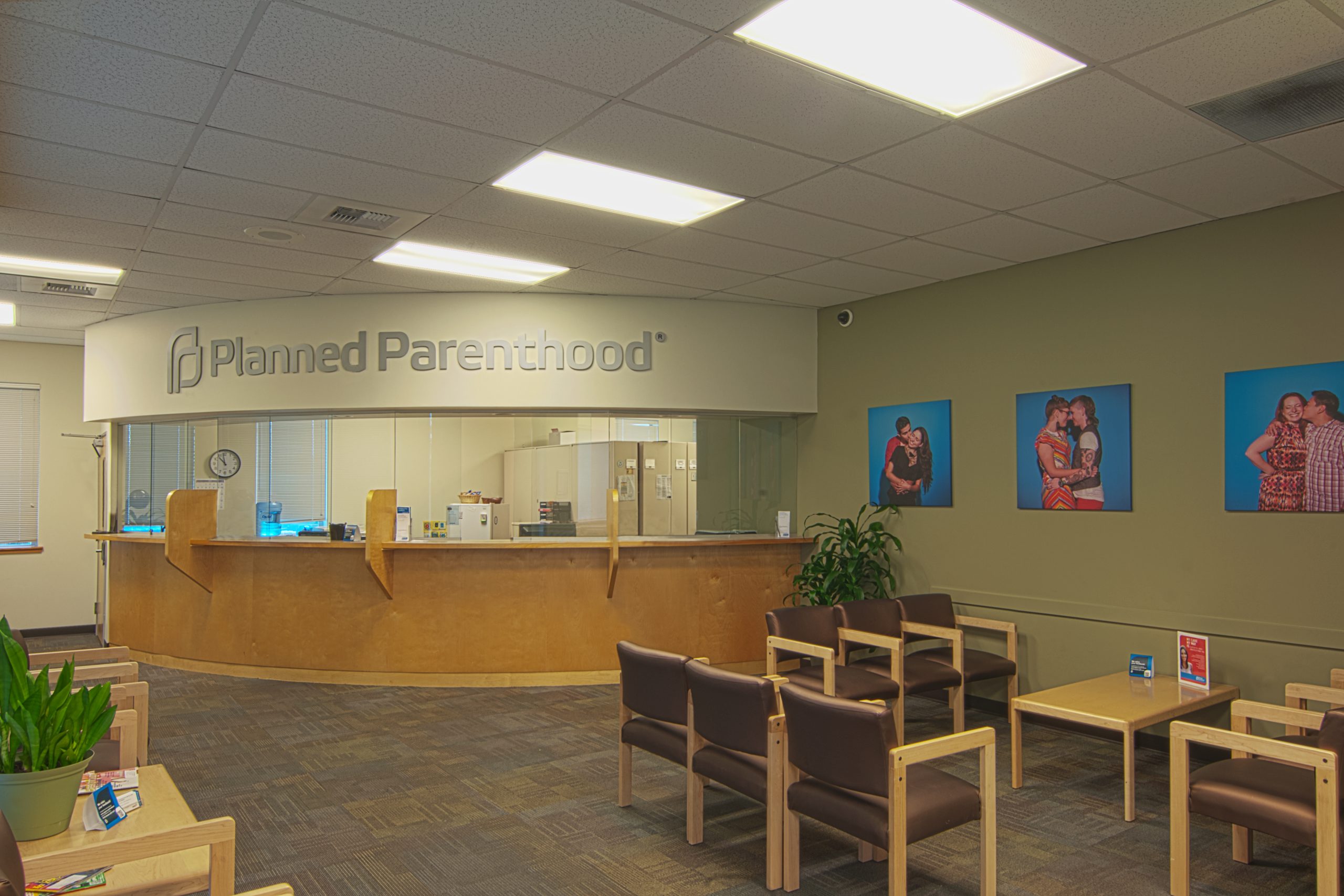 A Planned Parenthood waiting room that shows empty chair in a medical building