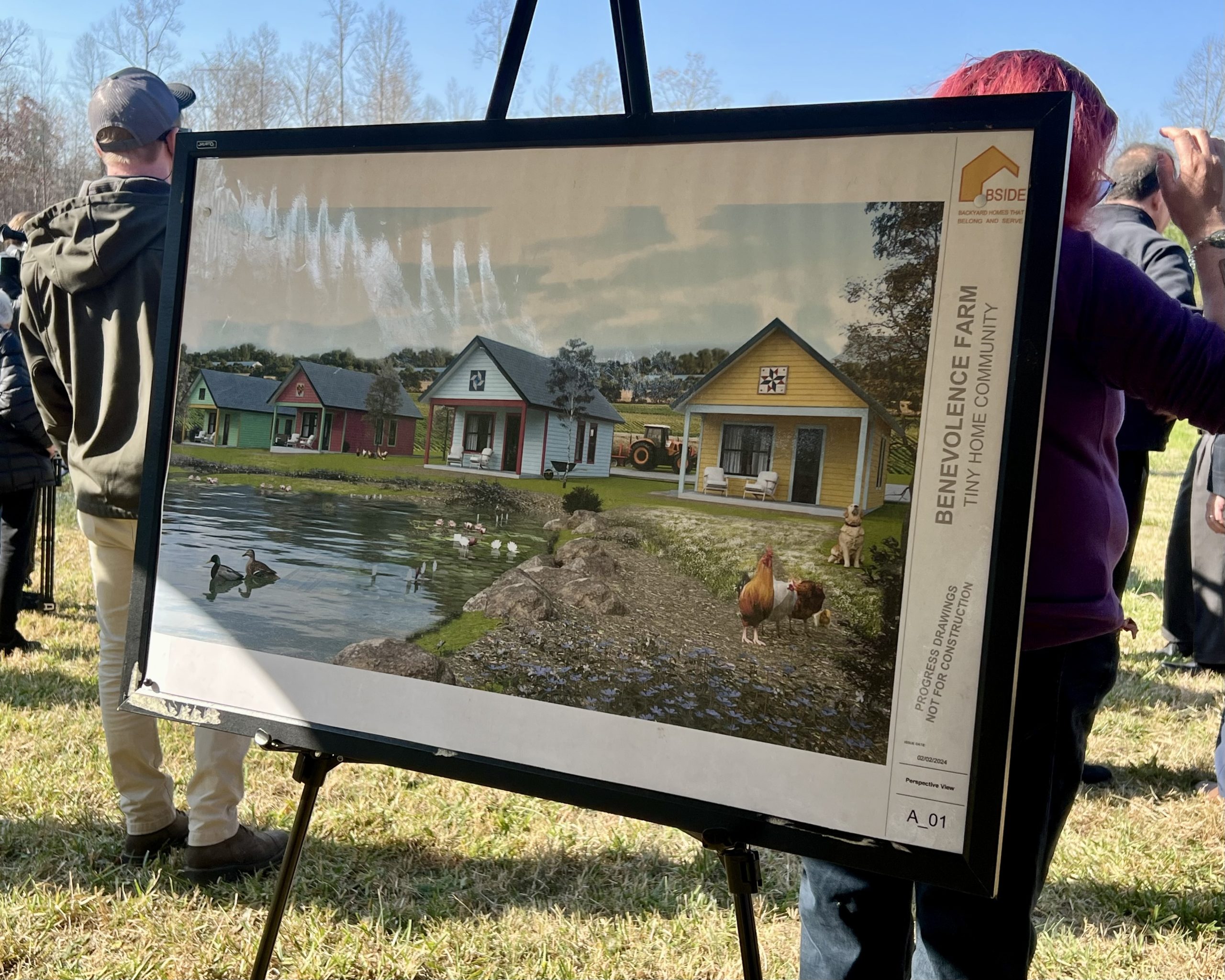 A rendering of Benevolence Farm's tiny home community. Colorful tiny homes are shown on a farm.