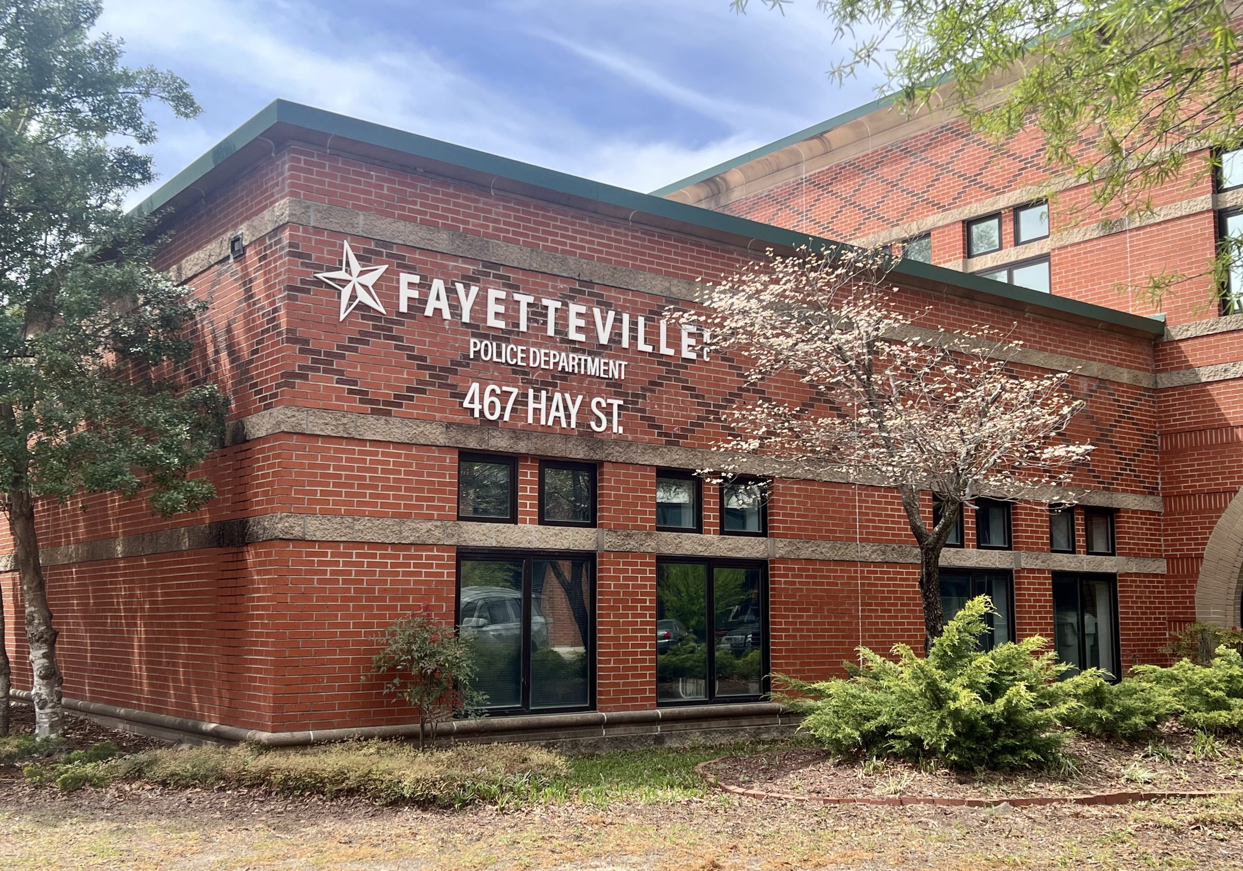 A brick building with the words 
