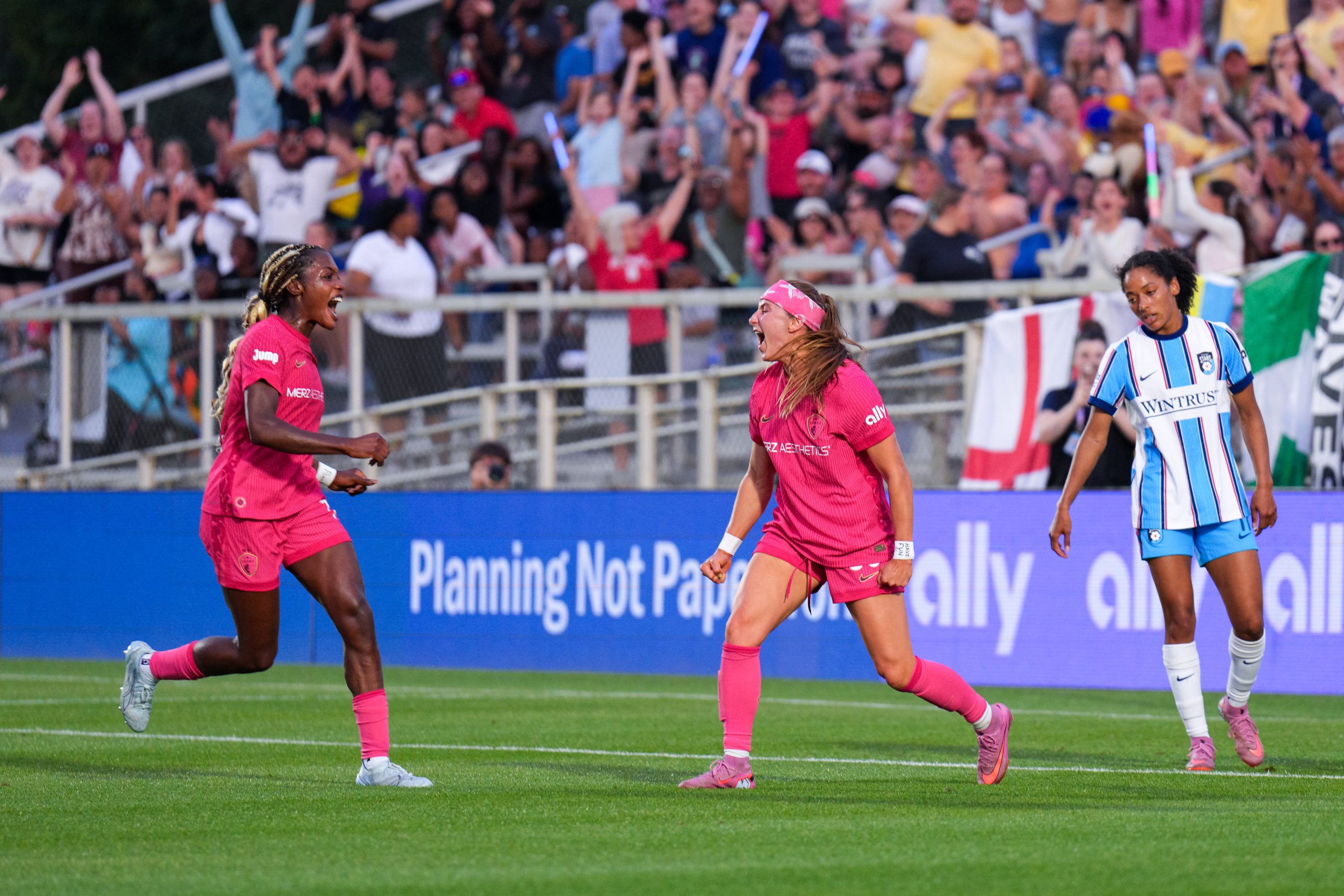 NC Courage forward Ally Schlegel (35) celebrates her goal with forward Evelyn Ijeh (10) during a match between the NC Courage and Chicago Stars FC in Week 8 of the 2026 NWSL regular season at First Horizon Stadium at WakeMed Soccer Park in Cary, NC - Saturday, May 16, 2026. The Courage launched the Courageously Cool Summer Initiative in 2025 to keep fans safer during extreme heat.